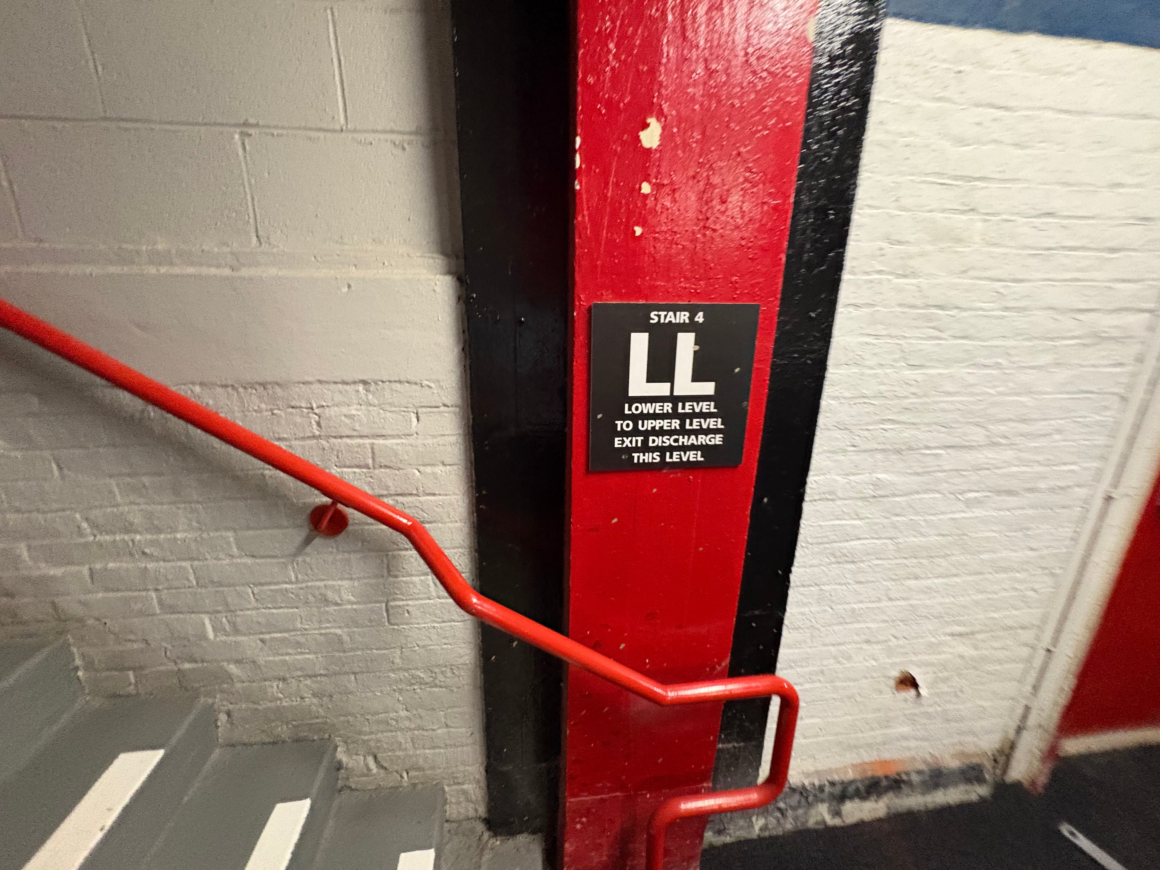 Stair 4 - LL Lower Level to Upper Level Sign