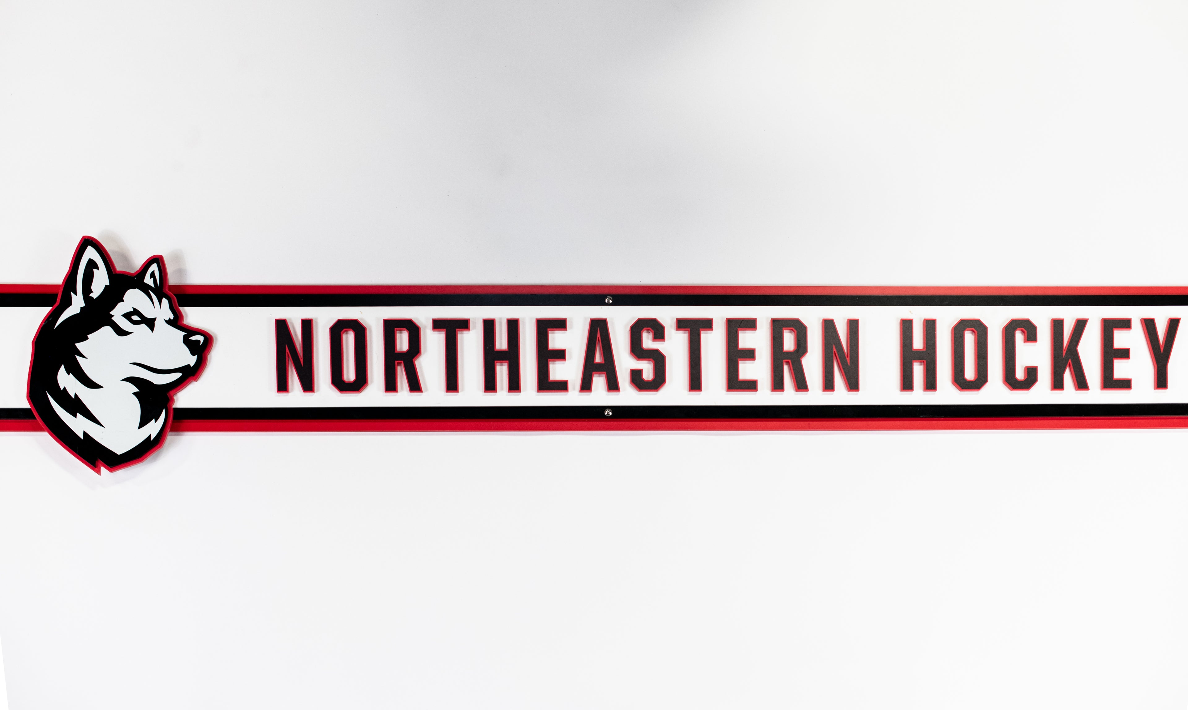 Men’s Locker Room Long NU Huskies Sign