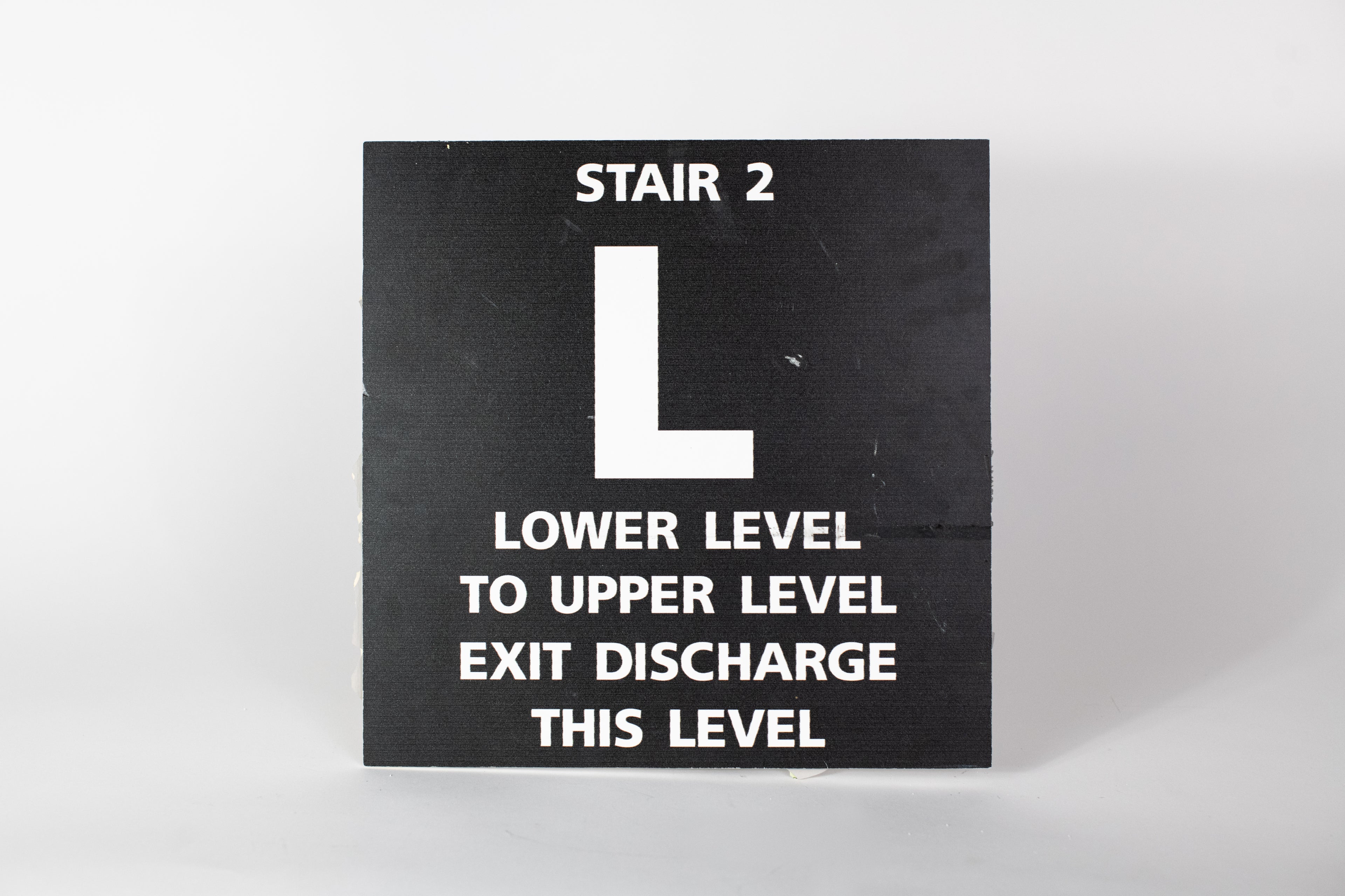 Stair 2 - L Lower Level to Upper Level Sign