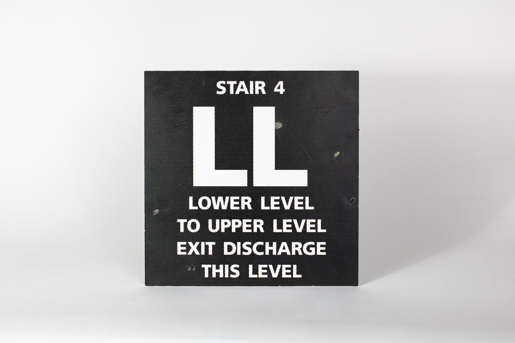 Stair 4 - LL Lower Level to Upper Level Sign