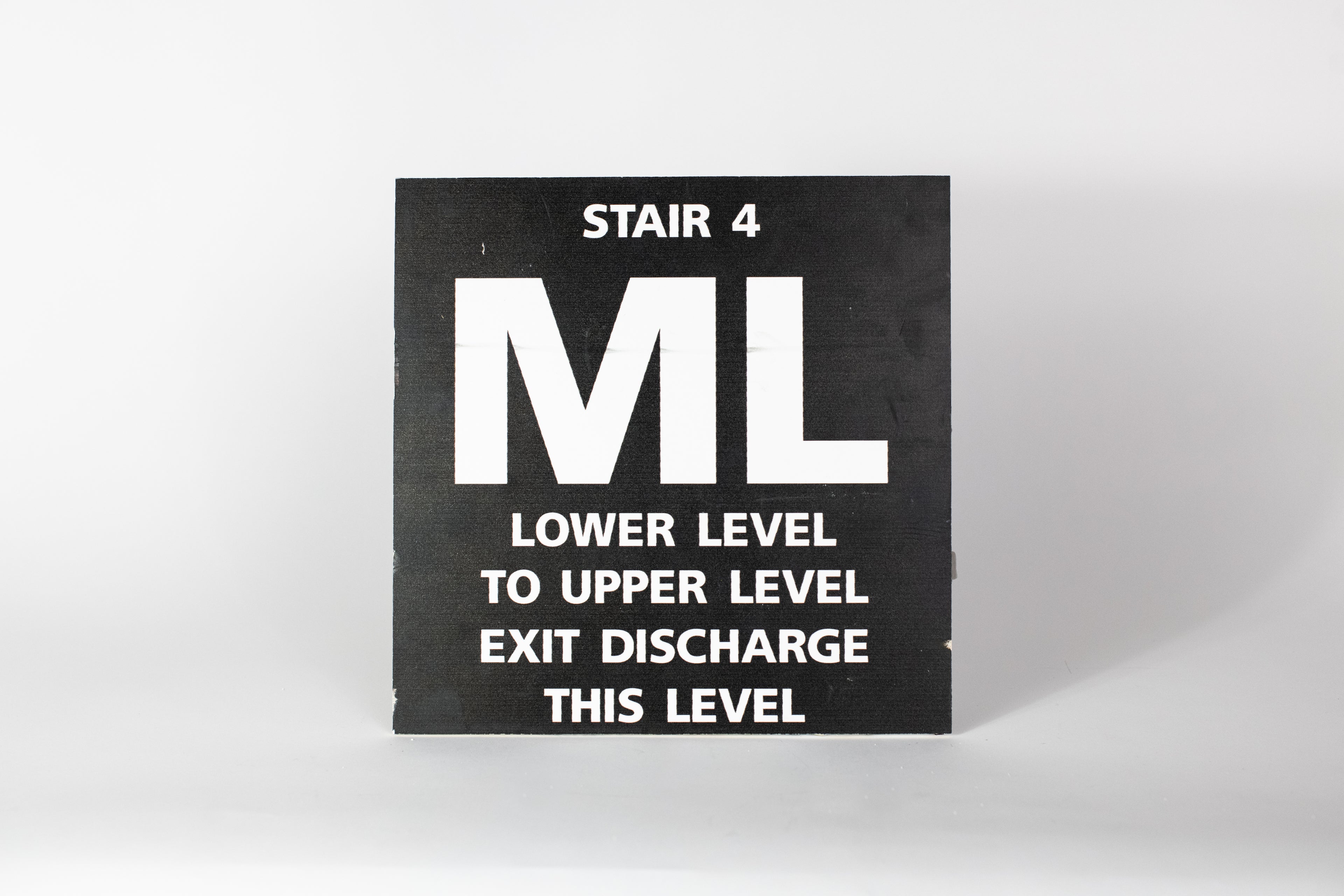 Stair 4- ML Lower Level to Upper Level Sign